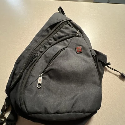 Swiss Tech Crossbody Bag  Sling Backpack Padded Straps And Back Pad. Black - Image 1 of 4