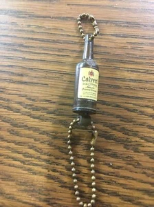 Vintage Calvert Reserve Whiskey Key Chain Advertising Coin Holder VTG - Picture 1 of 3