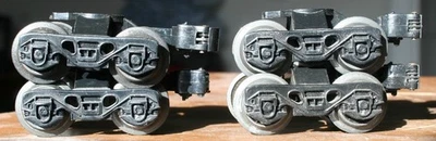 Lionel 9050 trucks - set of 4 - 3 with operating couplers & 1 with fixed coupler - Image 1 of 4