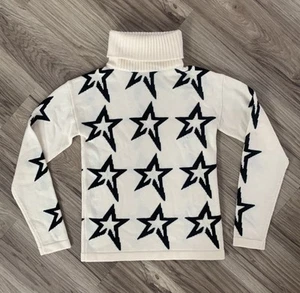NUEVO CON ETIQUETAS Perfect Moment Star Jersey Lana Merino en Blanco/Negro Estrella Talla XS - Imagen 1 de 6