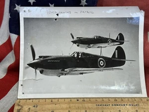 WW2 press release pic-TOM A HAWK IN FLIGHT DAMAGED - Picture 1 of 5