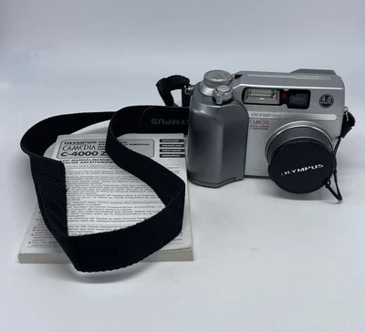 Olympus CAMEDIA C-4000 Zoom 4.0MP Digitalkamera silber - Bild 1 von 4