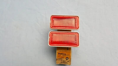 NOS 1968-69 PONTIAC+OLDS+BUICK STATION WAGON RR QTR MARKER LAMP LENSES 916584 PR Foto 1 de 3