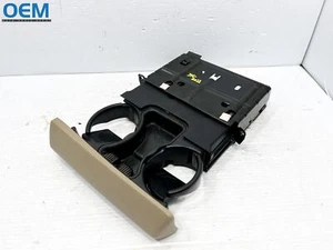2005-2007 FORD F250 F350 CENTER DASH MOUNTED SLIDE PULL OUT CUP HOLDER BEIGE OEM - Picture 1 of 6
