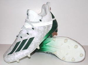 white adidas cleats