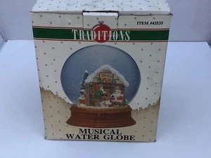 Globo de nieve musical de Navidad Santa's Workshop #43535 de Traditions  - Imagen 1 de 11
