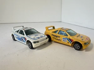 2x Burago Peugeot 405 Safari Rally Car Vintage Diecast Scale 1:43 - Picture 1 of 20