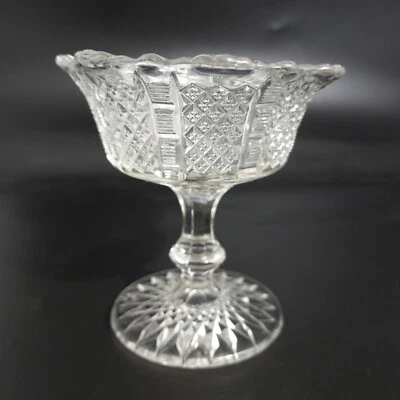 Hermoso frutero de compota de caramelo pedestal con patas con tallo transparente de plomo Foto 1 de 4