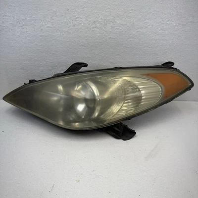 Faro halógeno conductor izquierdo Toyota Solara 2004-2006 OEM Foto 1 de 4