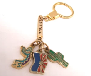 VTG KEY CHAIN ARIZONA GOLD TONE CHARMS CACTUS STATAE FLAG & KOKOPELLI - Picture 1 of 4