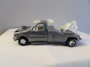 RAW ZAMAC 2000 FORD F-550 TOW TRUCK 2001 JOHNNY LIGHTNING REBEL RODS 1:64 - Picture 1 of 7