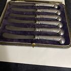 six Sterling handled English knives