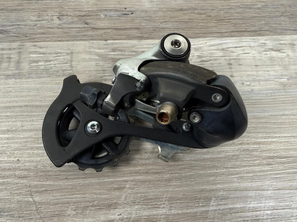 Shimano Altus RD-M310 Bike Rear Derailleur 7/8 Speed Medium Cage - Image 1 of 4