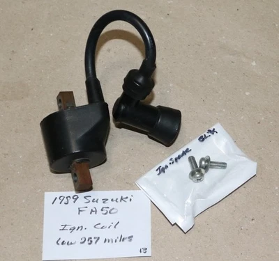 Suzuki FA50 1989 OEM bobina de encendido con tornillos... (257 pocas millas) Foto 1 de 2