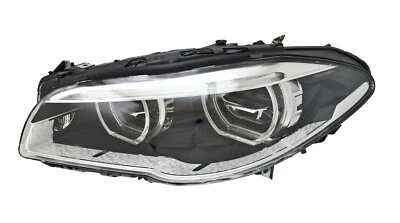 Conjunto de faros Hella para BMW 011072951 Foto 1 de 4