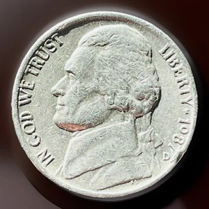 1987 D Jefferson Nickel. Obverse Cud - Picture 1 of 2