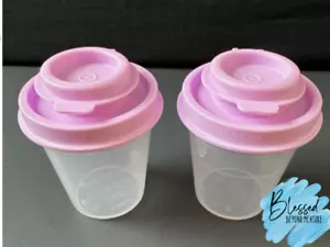New TUPPERWARE Salt and & Pepper Shakers Midgets Clear 2 oz Pink Seals - Picture 1 of 1