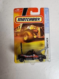 NEW IN PACKAGE 1/64 2007 MATCHBOX CITY ACTION GMC WRECKER #51 BLACK TOW TRUCK - Picture 1 of 11