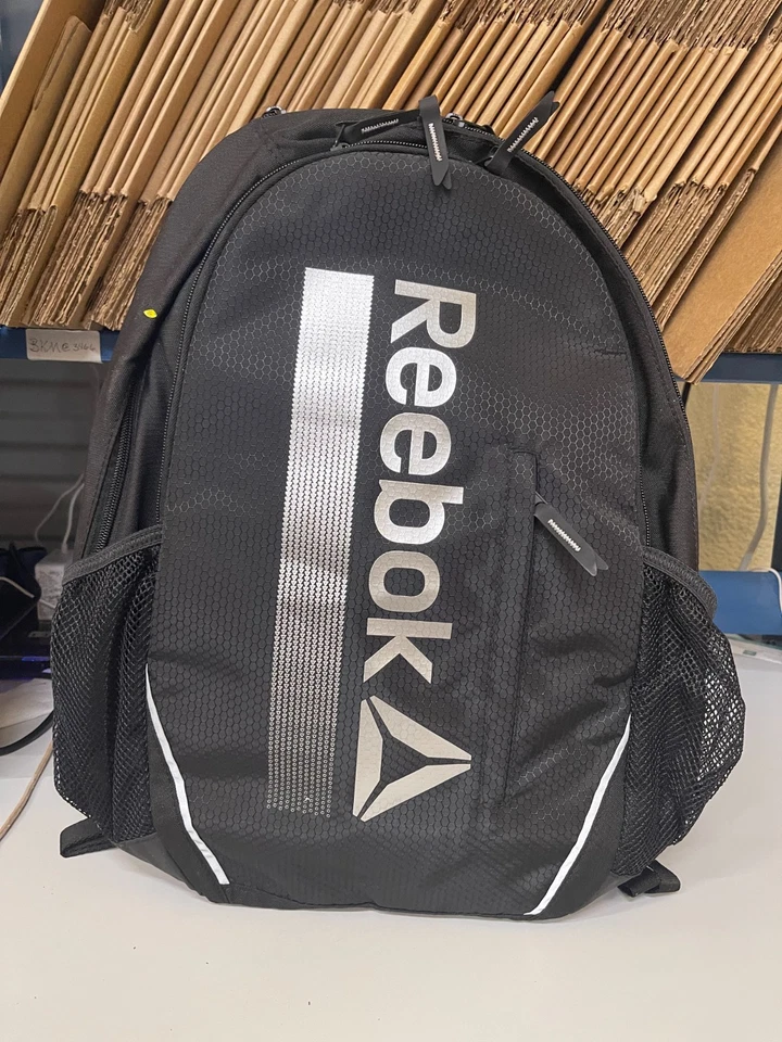 Reebok Trainer Backpack Black/Silver front pocket side pouches and padded straps