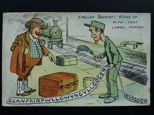 Cymru Anglesey RAILWAY PORTER & TOURIST Llanfairpwllgwyn..gogogoch c1907 PC - Picture 1 of 2
