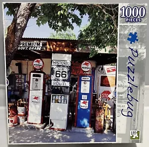 1000 Piece Puzzle "Vintage Gas Pumps on Route 66, Hackberry, Arizona" Puzzlebug - Picture 1 of 4