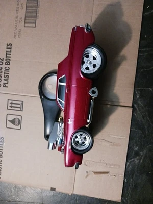 Muscle Machines 1963 Plymouth Savoy Gasser. Púrpura. Escala 1:18  Foto 1 de 4