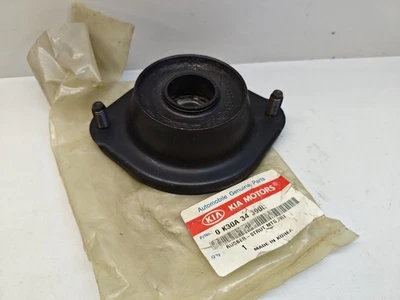 KIA Rio 2000-2005 suspensión delantera puntal montaje goma 0K30A34390C genuino Foto 1 de 4