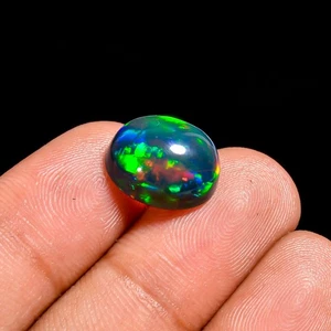 Schwarzer Opal Cabochon 4,00 kt Atemberaubendes Farbspiel! Perfekt für Schmuck - Bild 1 von 3