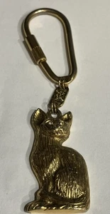 Schlüsselanhänger Katze Marke 1928 goldfarben mit funkelnden Augen in super Zustand - Bild 1 von 2