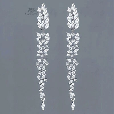 Pendientes largos colgantes circonitas cúbicas transparentes enchapados en oro blanco elegantes mujeres plateados Foto 1 de 4