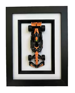 Modelo Bburago 1/43 F1 Mclaren MCL38 #4 Lando Norris 2024 Miami GP en marco negro - Imagen 1 de 10