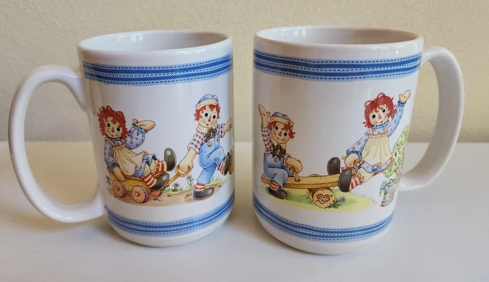 VTG Set Of Raggedy Ann Andy Coffee Tea Cup Mug 16 oz Houston Harvest Gift #31920 - Image 1 of 2