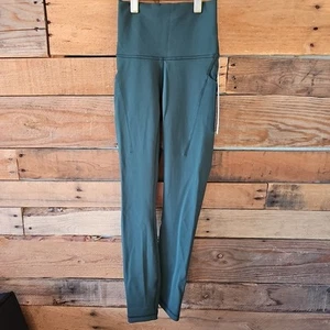 Leggings Lululemon nuovi con etichette taglia 0 Wunder treno vita alta HR stretti 25" verde eredità - Foto 1 di 9