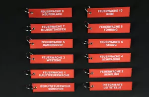Schlüsselanhänger Berufsfeuerwehr München versch. Wachen "Remove befor Flight" - Bild 1 von 1