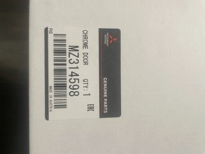 PUERTA CROMADA MZ314598 MOTOR MITSUBISHI Foto 1 de 4