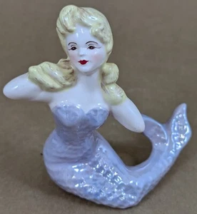 FLORENCE CERAMICS MERRYMAID MERMAID BLONDE PURPLE DRESS SITTING FIGURINE - Picture 1 of 5