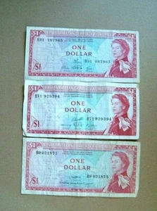 East Caribbean Banknotes $1 Bank Notes 1965- Sign 2/6/10-Queen Elizabeth II - Picture 1 of 2