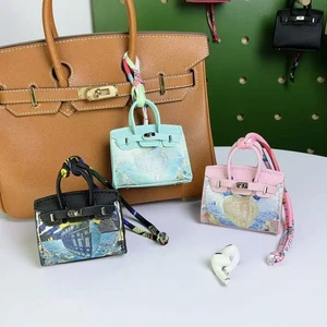 Mini bolso estilo diseñador con colgante bolsa de auriculares con cartera floral en relieve - Imagen 1 de 11
