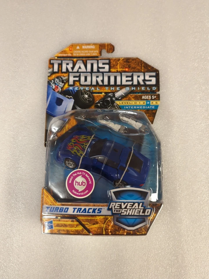 Transformers TURBO TRACKS Reveal the Shield Rts Classic Deluxe 2010  - Image 1 of 2