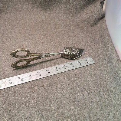 Pinzas para sándwich con asas de plata esterlina acero inoxidable Alemania ornamentadas Foto 1 de 4