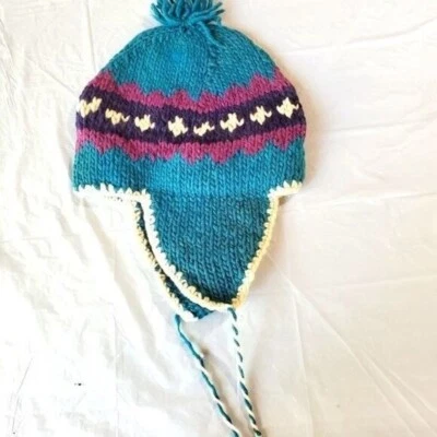 Винтажная вязаная шляпа ручной работы с ушными клапанами и кисточками - Изображение 1 из 4