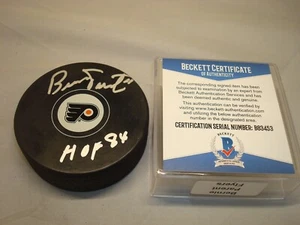 Disco de hockey Bernie firmado por los padres de los Philadelphia Flyers automático Beckett BAJO AUTENTICIDAD 1C - Imagen 1 de 3