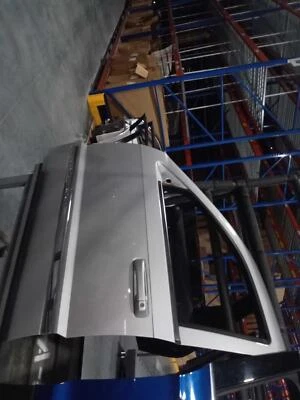 Jeep Grand Cherokee 2008 puerta delantera izquierda plateada 443567 149 k millas usado Foto 1 de 3