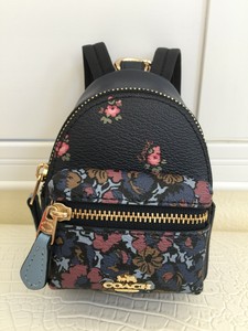 coach floral mini backpack