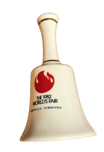 Campana de mano coleccionable 1982 Feria Mundial Knoxville Tennesse borde dorado 5 1/2" - Imagen 1 de 6