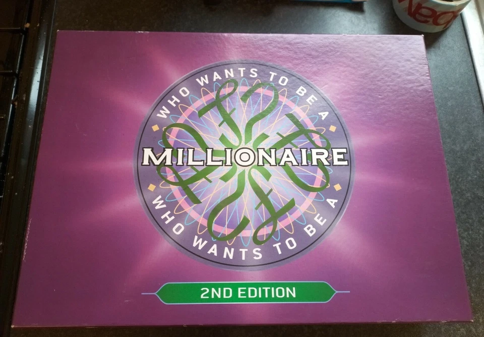 WHO WANTS TO BE A MILLIONAIRE 2ND EDITION "UNUSED PARTS UPSTARTS 2001 FAMILY FUN - Image 1 of 4