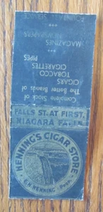 CUBIERTA BOBTAILED MATCHBOOK: HENNING'S CIGAR STORE NIAGARA FALLS NY MATCHCOVER -D3 - Imagen 1 de 2