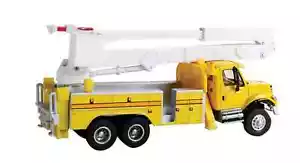 11752 Walthers SceneMaster International 7600 camion utilitario con sollevatore a secchio HO - Foto 1 di 2