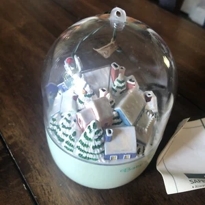 Hallmark Keepsake Magic Light & Motion Baby's First Christmas 1990 Ornament - Picture 1 of 10