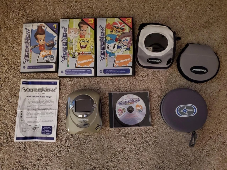 Цветной плеер Hasbro VideoNow зеленый с 8 чехлами для переноски PVD 2 PVD - Изображение 1 из 1